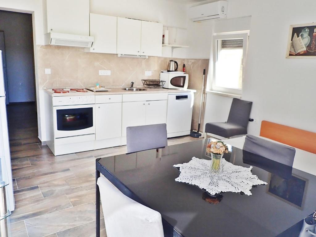 Kuchyňa alebo kuchynka v ubytovaní Apartman Morjani