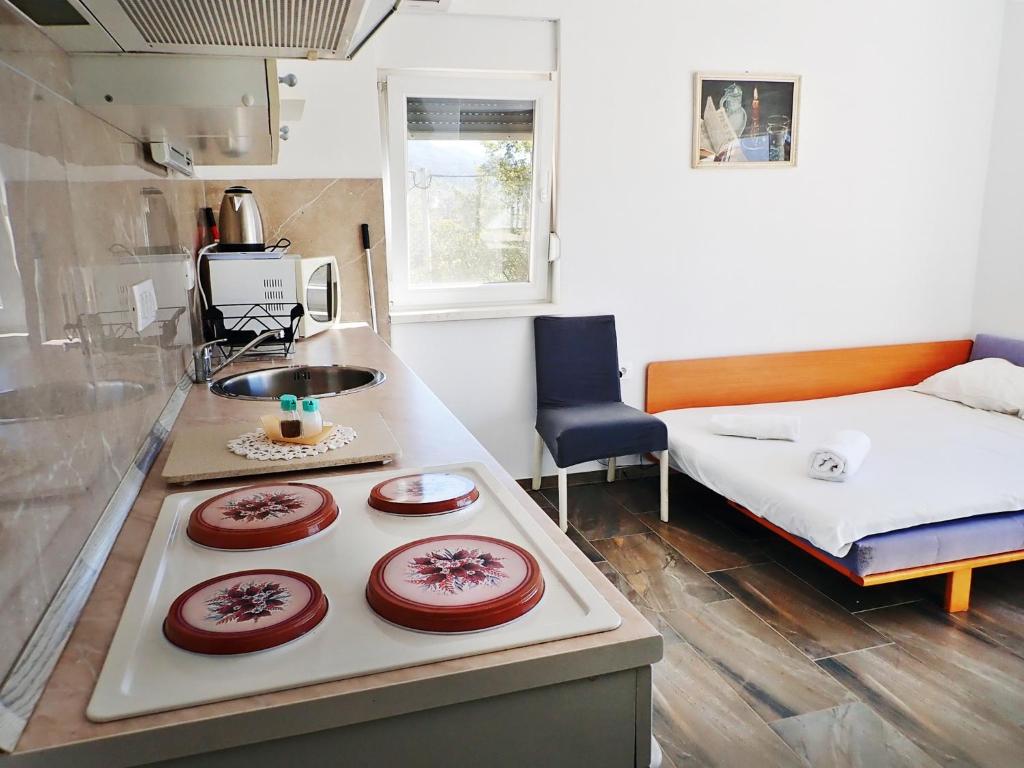Kuchyňa alebo kuchynka v ubytovaní Apartman Morjani