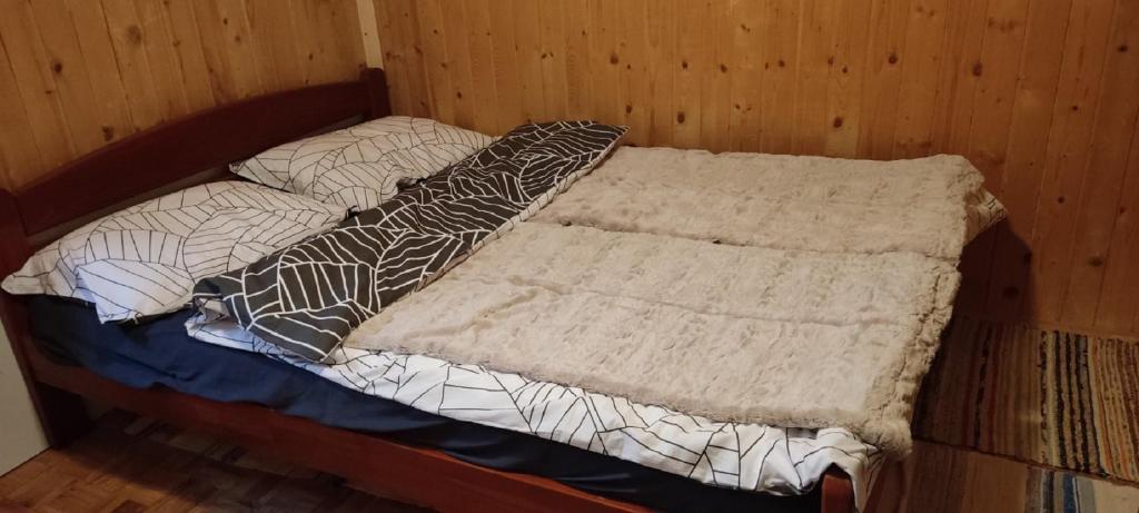 Postel nebo postele na pokoji v ubytování Sova