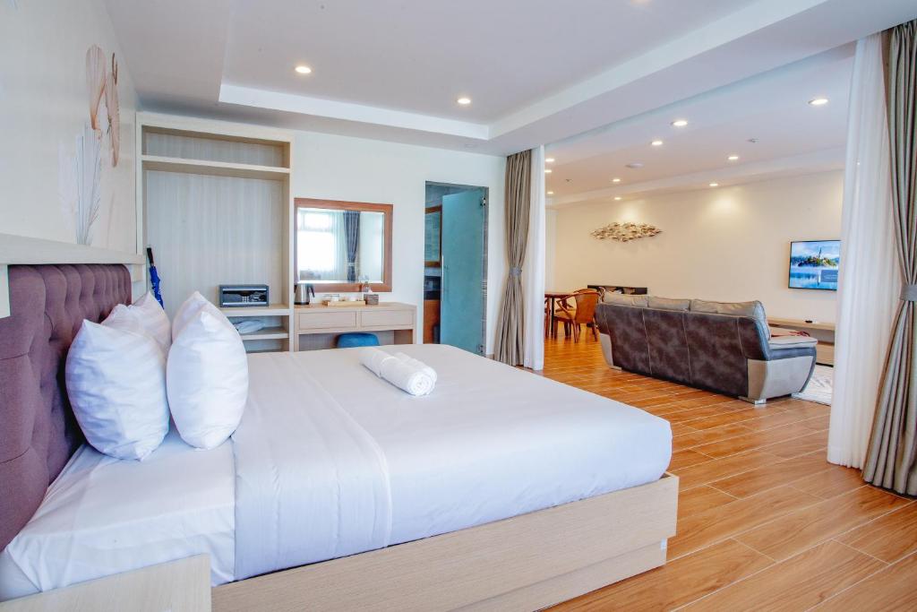 Postel nebo postele na pokoji v ubytování Ora Beach Resort