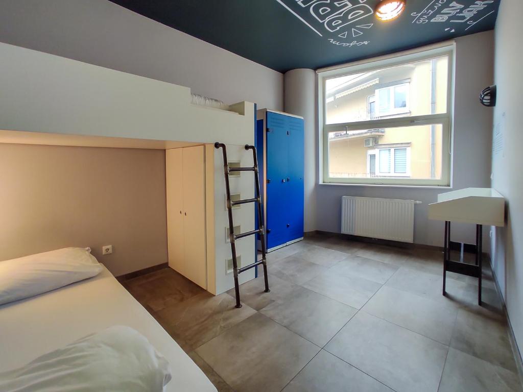 Posteľ alebo postele v izbe v ubytovaní Main Square Hostel