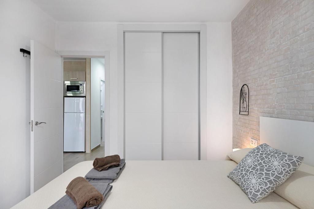 Postel nebo postele na pokoji v ubytování Apartamento Rubí