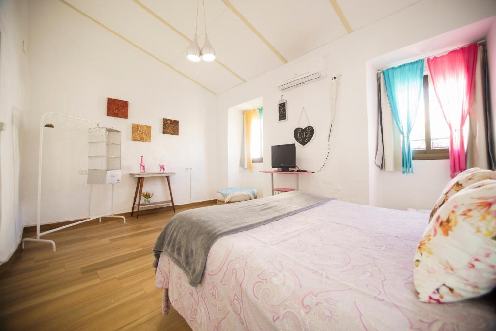 Posteľ alebo postele v izbe v ubytovaní Casa singular y con encanto