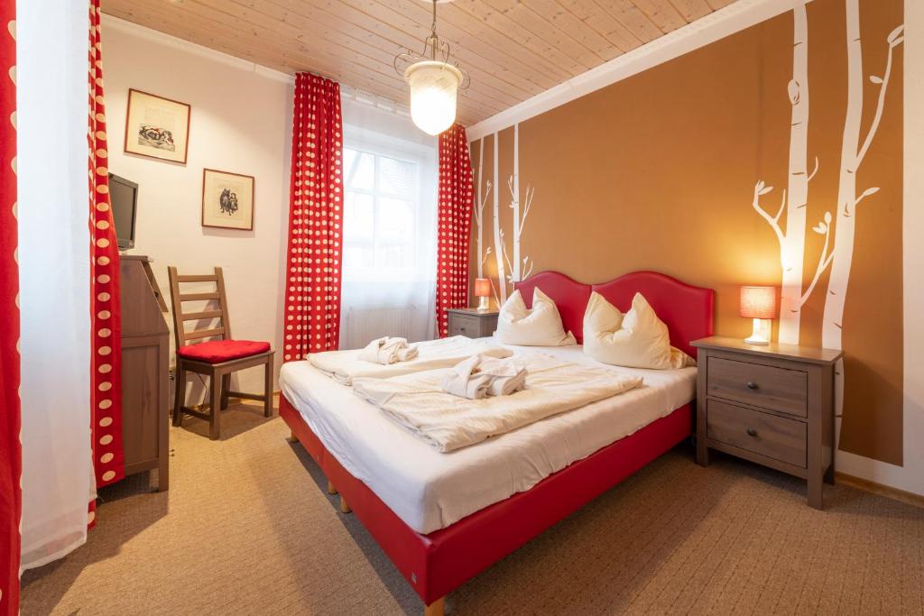 Postel nebo postele na pokoji v ubytování Landhotel Gasthof Stern