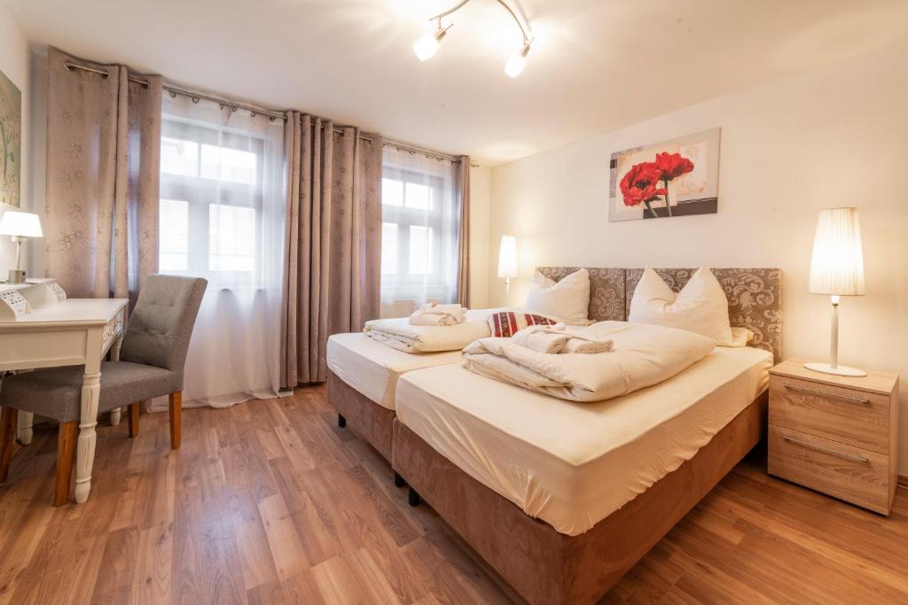 Postel nebo postele na pokoji v ubytování Landhotel Gasthof Stern