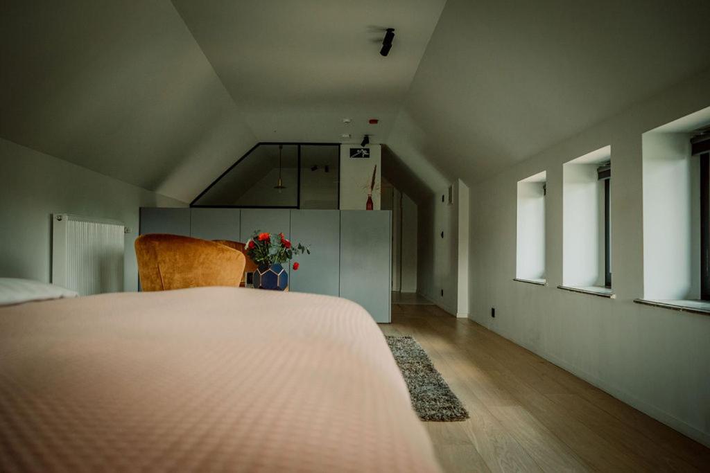 Postel nebo postele na pokoji v ubytování Relais M B&B