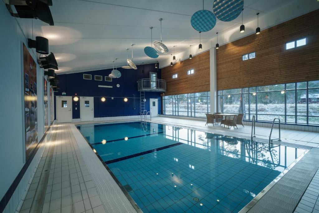 uma grande piscina num edifício em Bjorli Fjellstuer - by Classic Norway Hotels em Bjorli