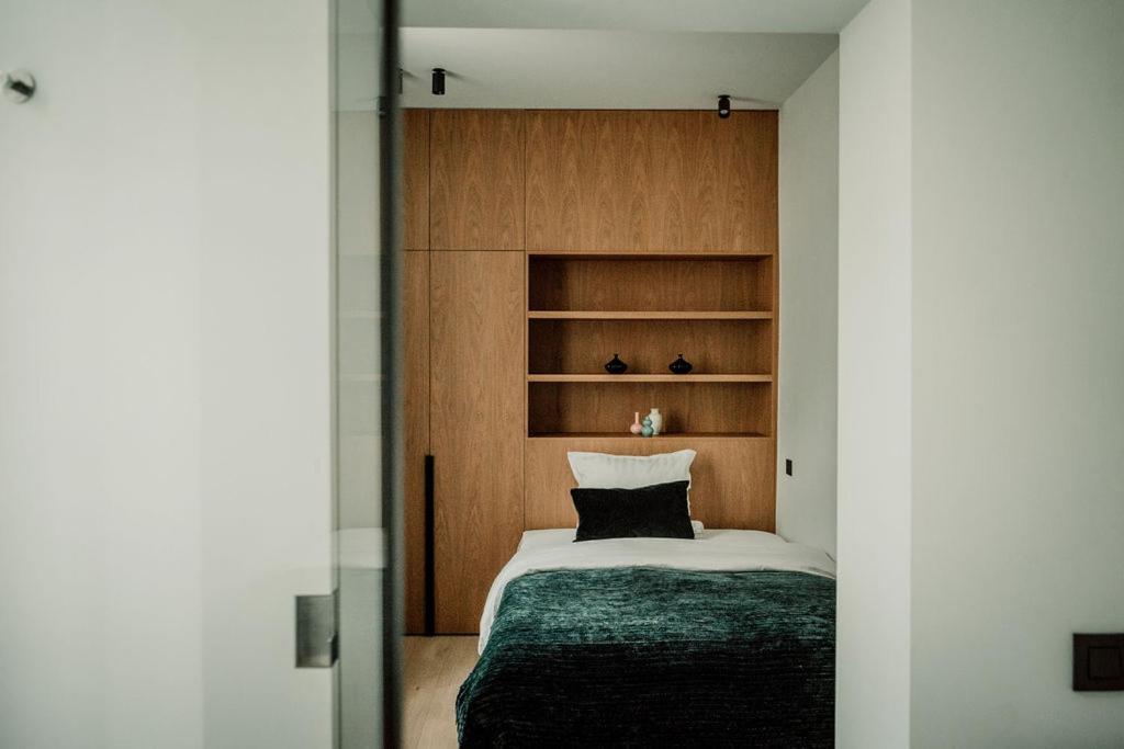 Postel nebo postele na pokoji v ubytování Relais M B&B