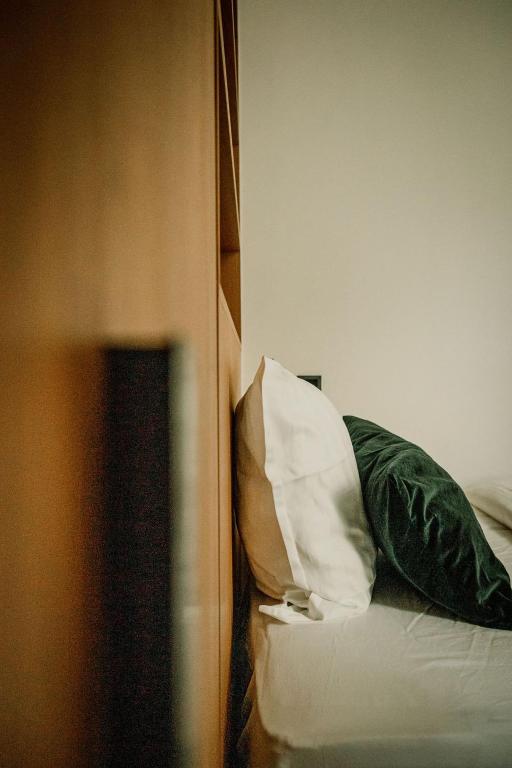 Postel nebo postele na pokoji v ubytování Relais M B&B