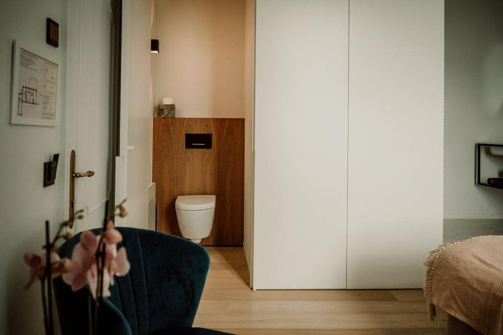 Postel nebo postele na pokoji v ubytování Relais M B&B