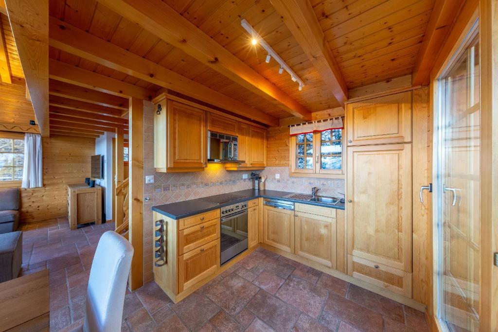 Kuchyň nebo kuchyňský kout v ubytování Chalet Ciel de Lit