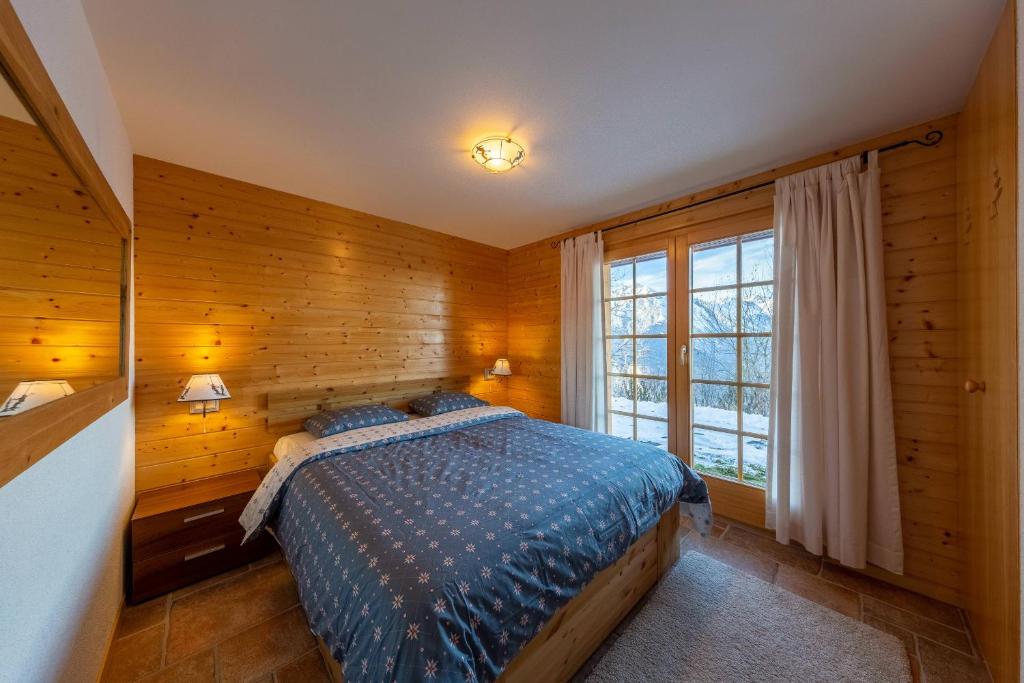 Postel nebo postele na pokoji v ubytování Chalet Ciel de Lit