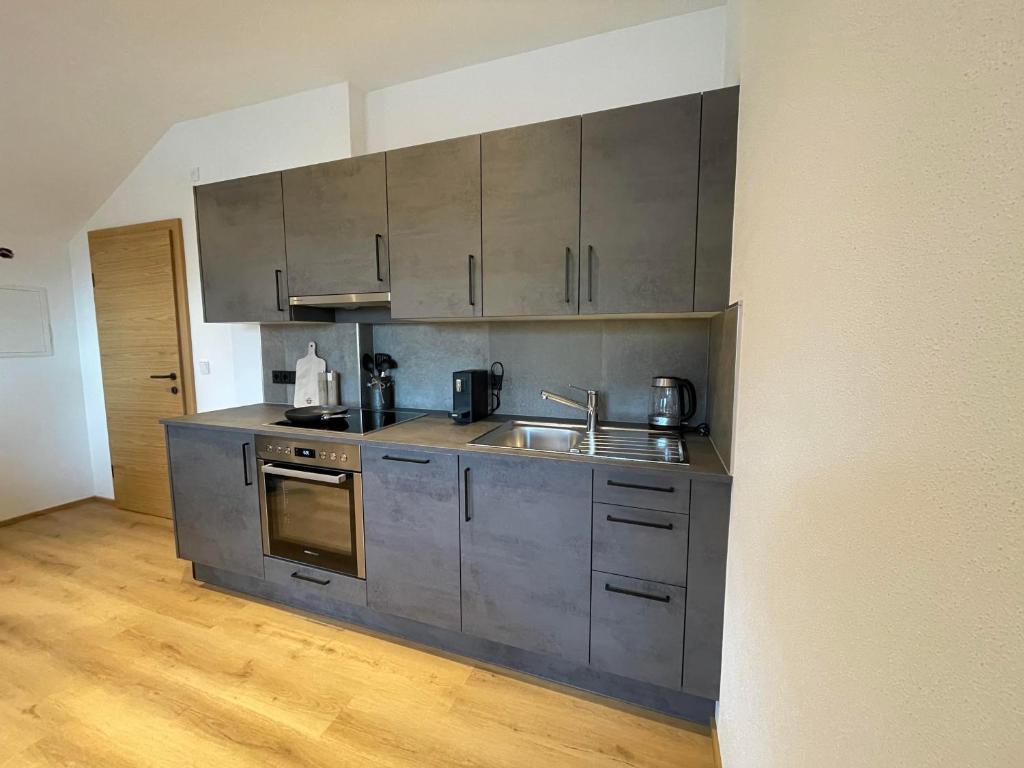 Kuchyň nebo kuchyňský kout v ubytování Schneiderhof