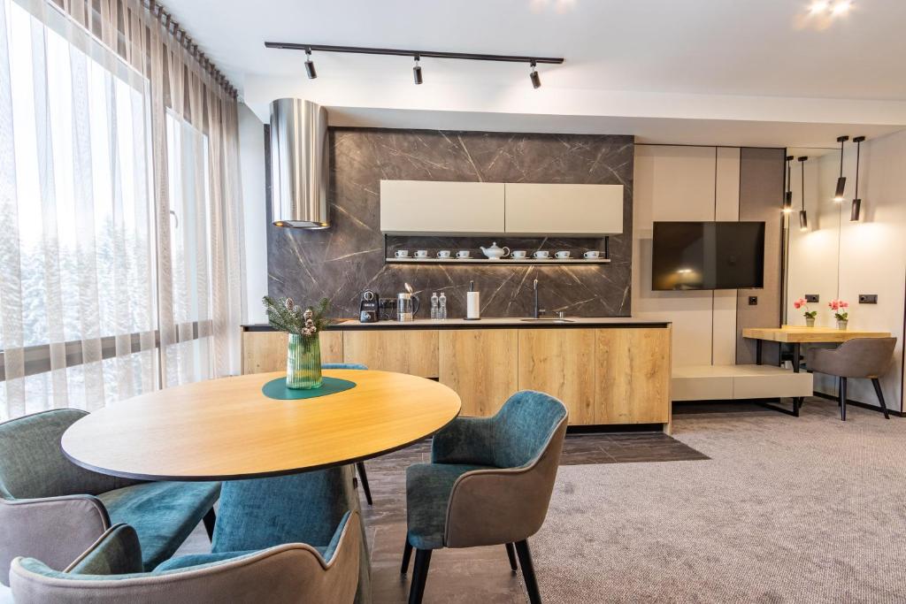 Kuchyň nebo kuchyňský kout v ubytování Shelter Apart Hotel