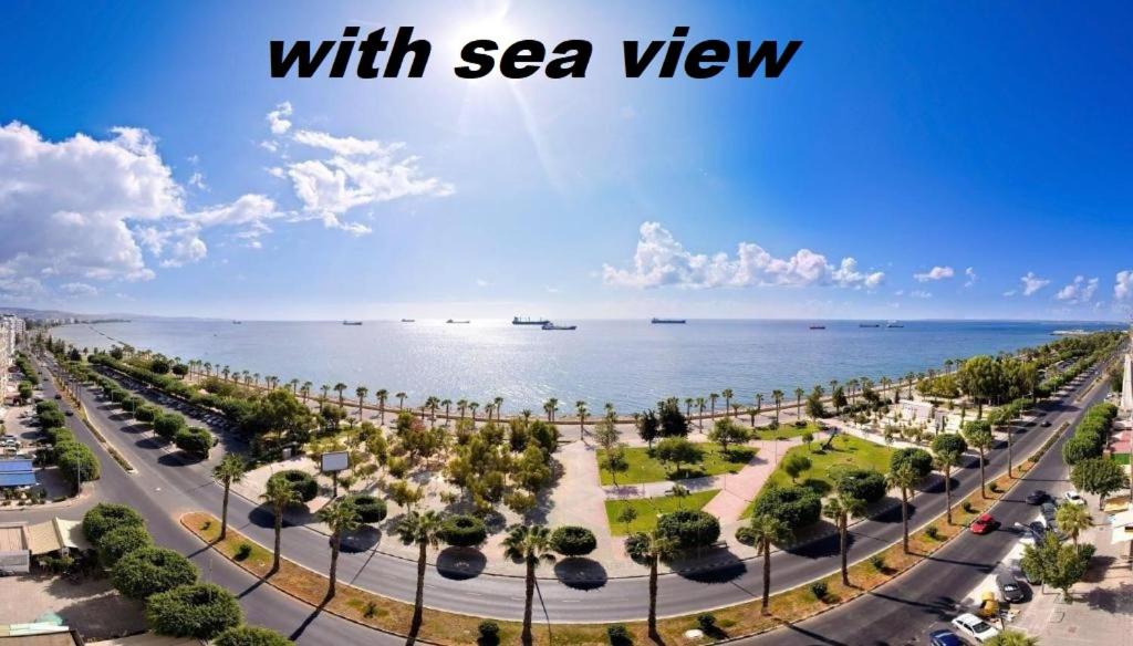 a view of the beach with the ocean in the background at White Hostel in Limassol