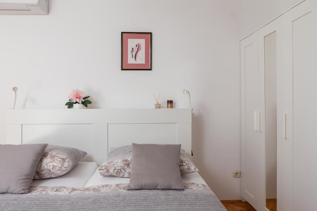 Posteľ alebo postele v izbe v ubytovaní Bounty Apartment