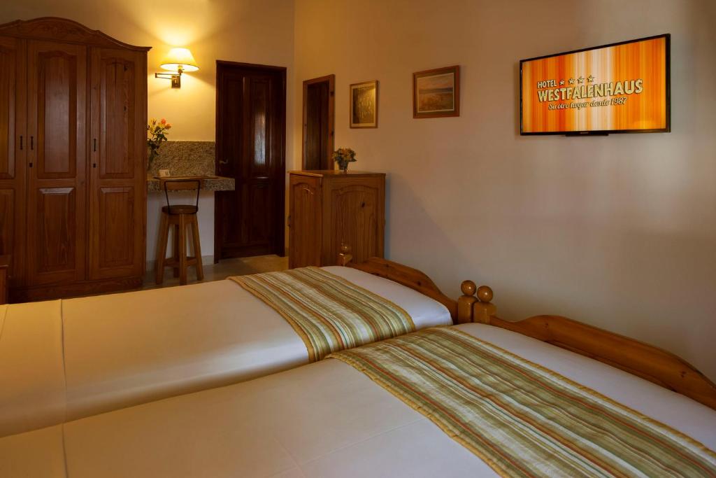 Postel nebo postele na pokoji v ubytování Hotel Westfalenhaus