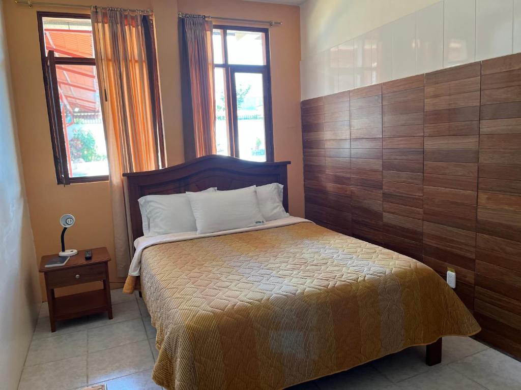 Postel nebo postele na pokoji v ubytování Hosteria Shell