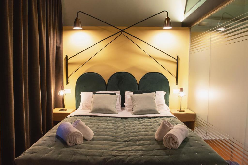 Posteľ alebo postele v izbe v ubytovaní Italianflat - Empireo Rooms - 200mt to Arena