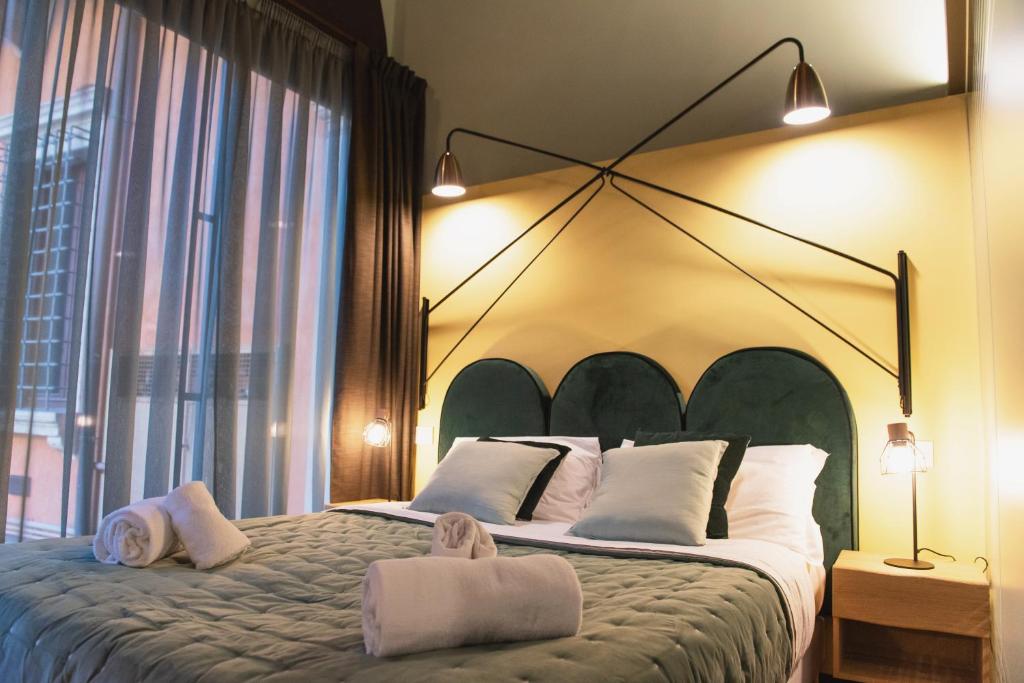 Posteľ alebo postele v izbe v ubytovaní Italianflat - Empireo Rooms - 200mt to Arena