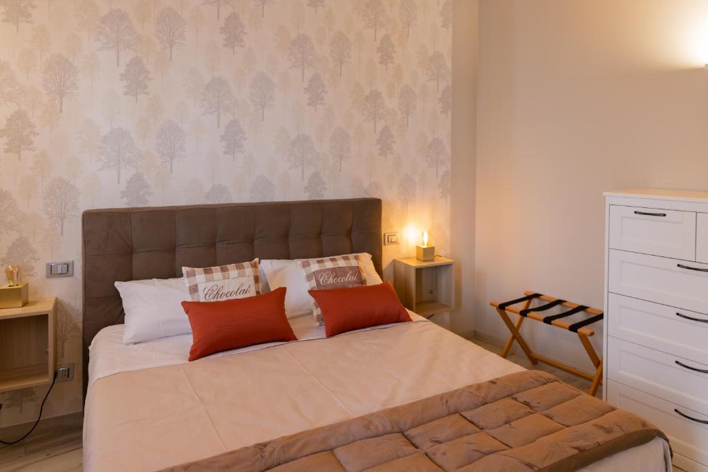 Postel nebo postele na pokoji v ubytování BuonVivere House