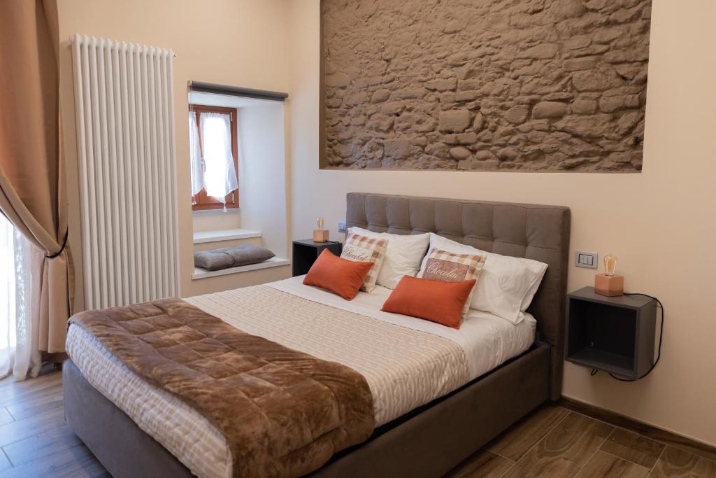 Postel nebo postele na pokoji v ubytování BuonVivere House