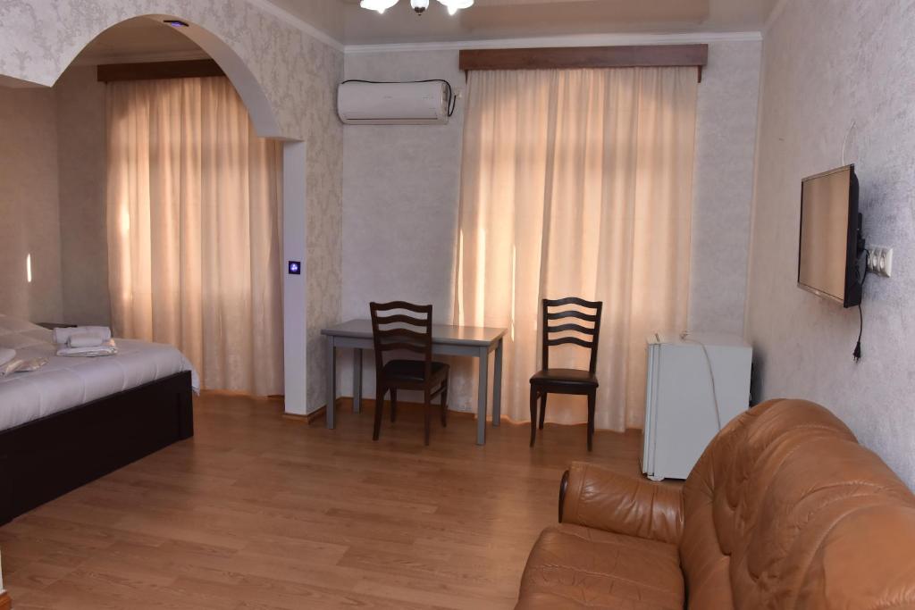 Postel nebo postele na pokoji v ubytování HOTEL SAMEGRELO