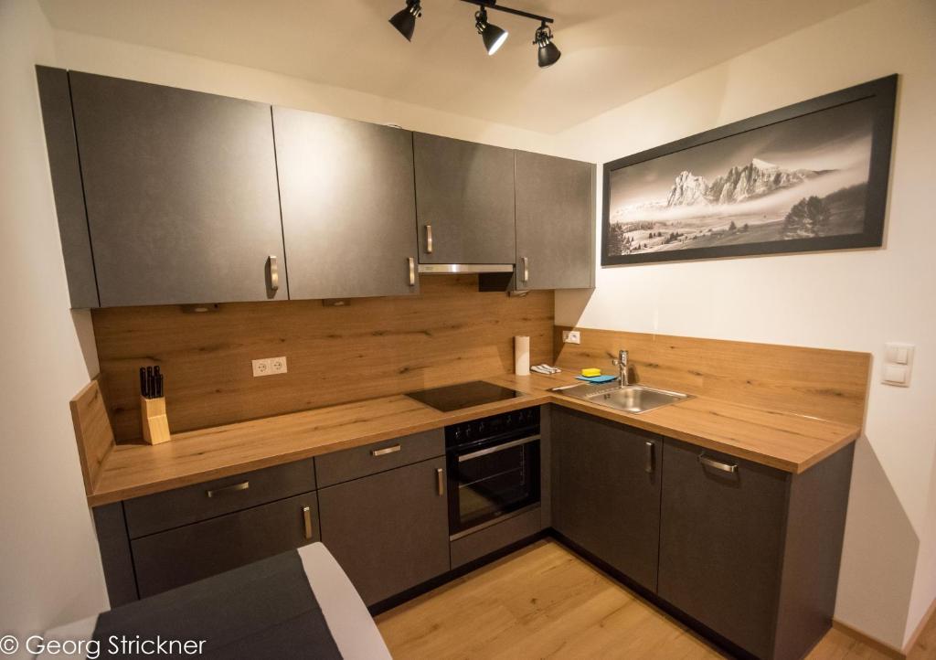 Kuchyň nebo kuchyňský kout v ubytování Ferienwohnung Strickner