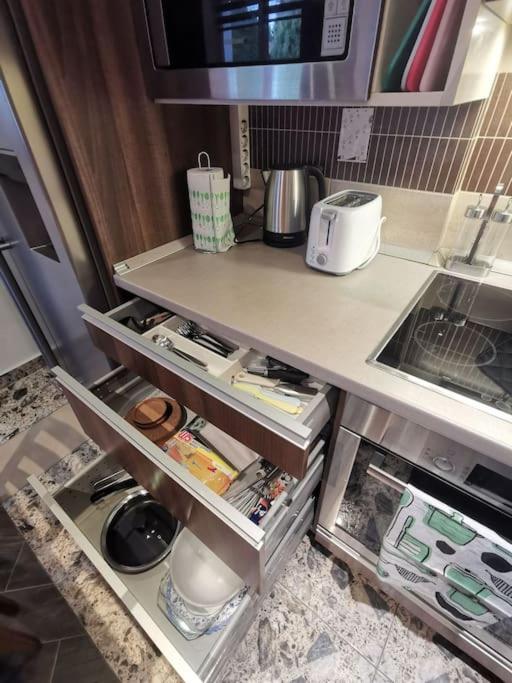 A kitchen or kitchenette at Erika's House.