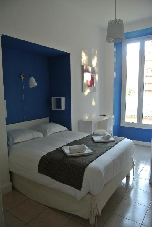 Postel nebo postele na pokoji v ubytování Hotel Danemark