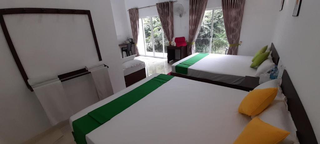 Postel nebo postele na pokoji v ubytování Senomaal Sigiri Resort