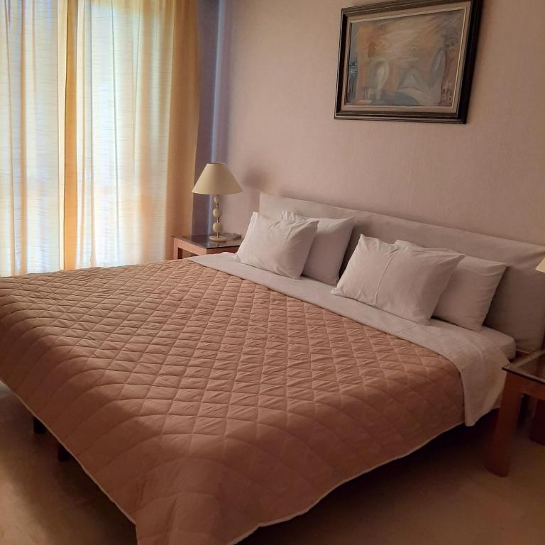 Postel nebo postele na pokoji v ubytování Hotel Elman