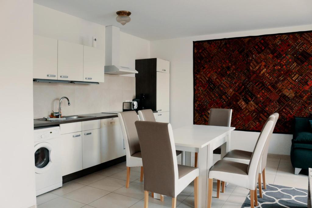 Kuchyň nebo kuchyňský kout v ubytování Vienna Airport Residences