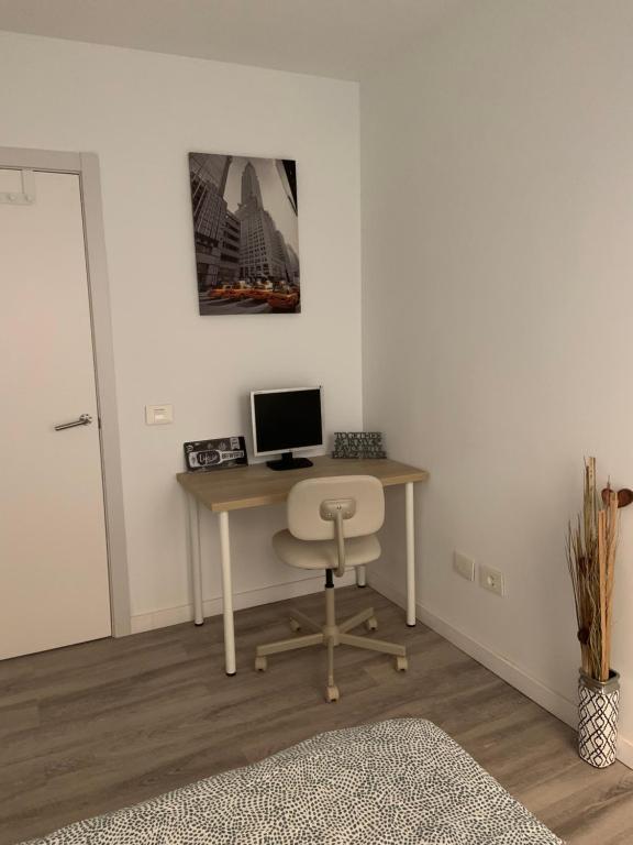 TV a/nebo společenská místnost v ubytování CoLiving El Toro