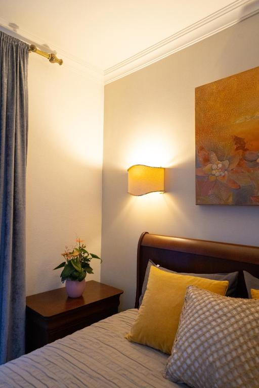 Postel nebo postele na pokoji v ubytování CASA BELGERI - Bed & Breakfast