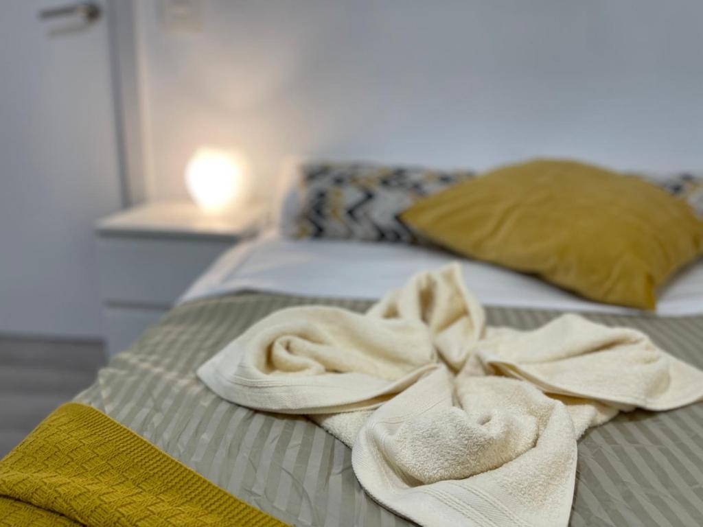 Postel nebo postele na pokoji v ubytování CoLiving El Toro