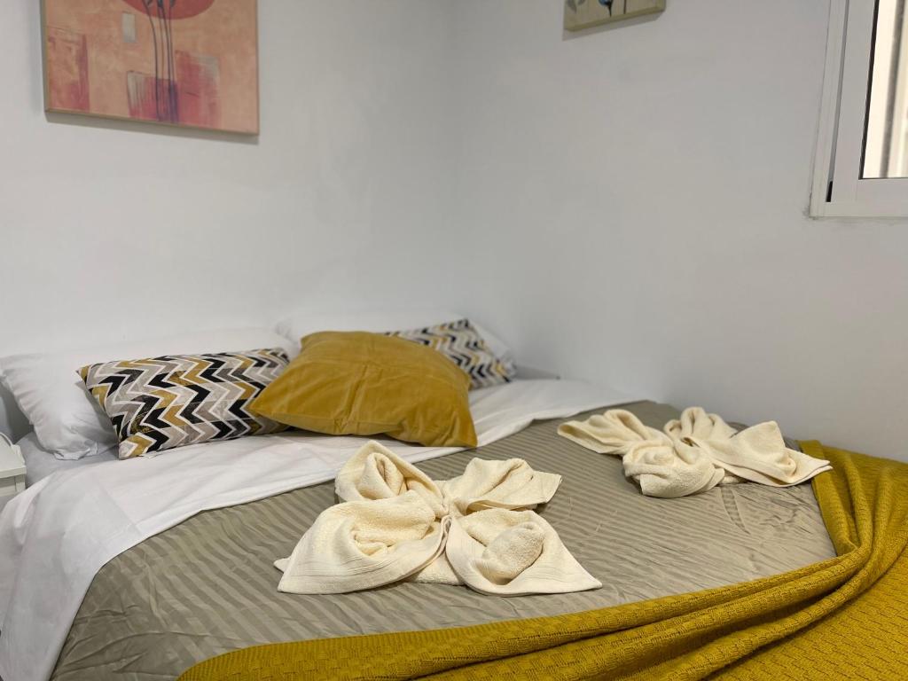 Postel nebo postele na pokoji v ubytování CoLiving El Toro