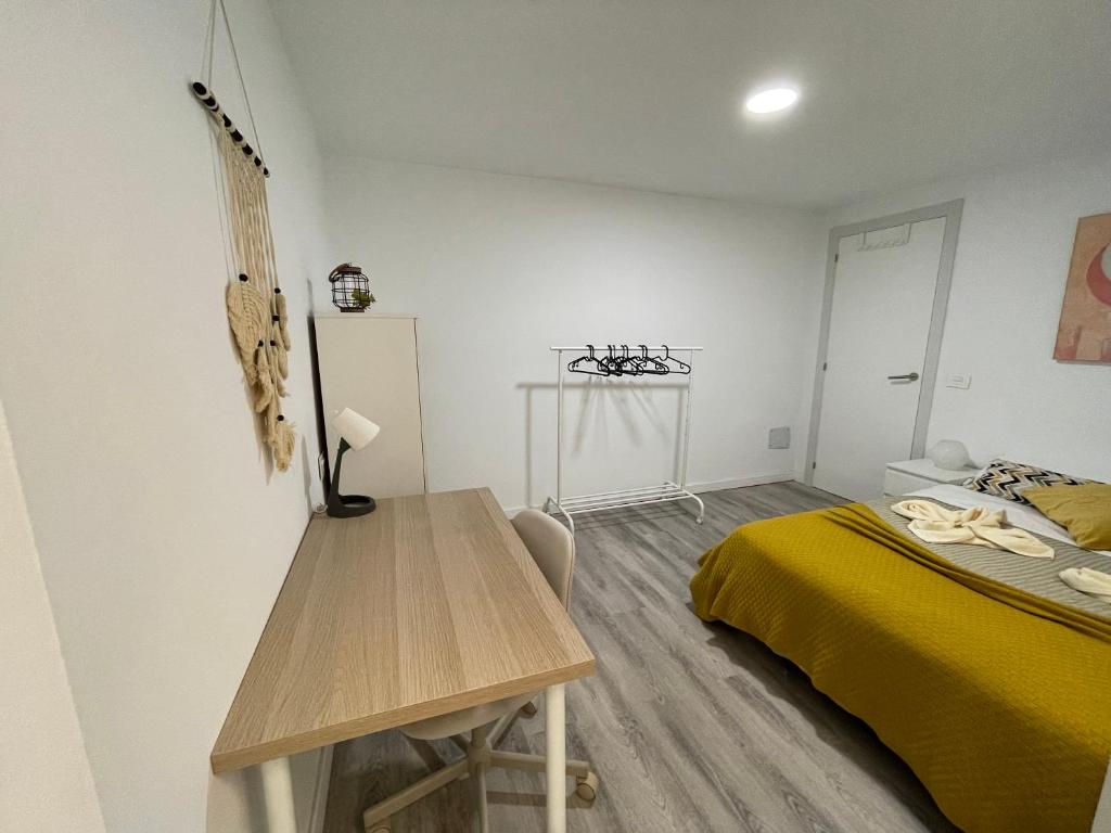Postel nebo postele na pokoji v ubytování CoLiving El Toro