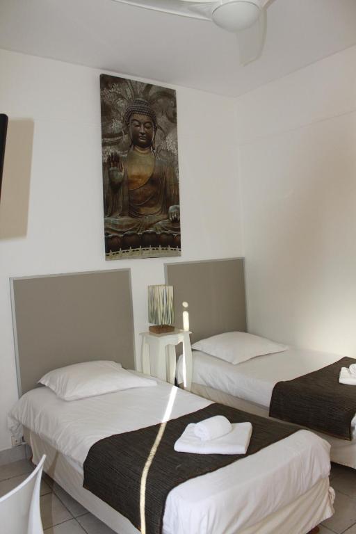 Postel nebo postele na pokoji v ubytování Hotel Danemark