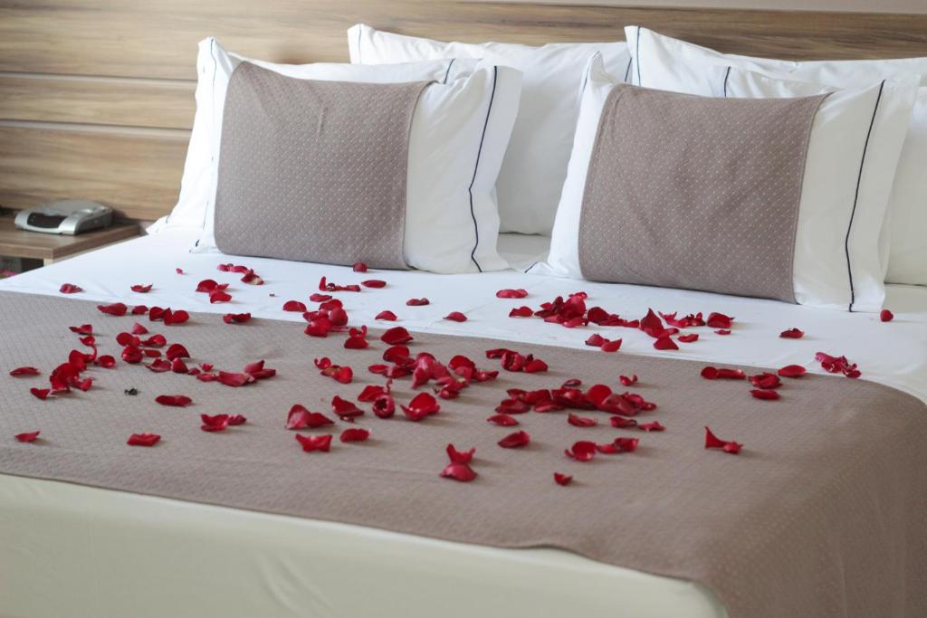Uma cama ou camas num quarto em Hotel del Príncipe