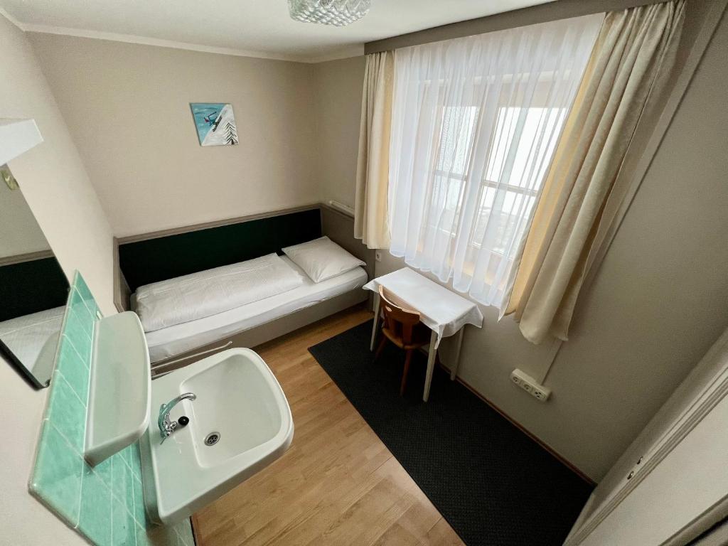Voodi või voodid majutusasutuse Lech Hostel toas