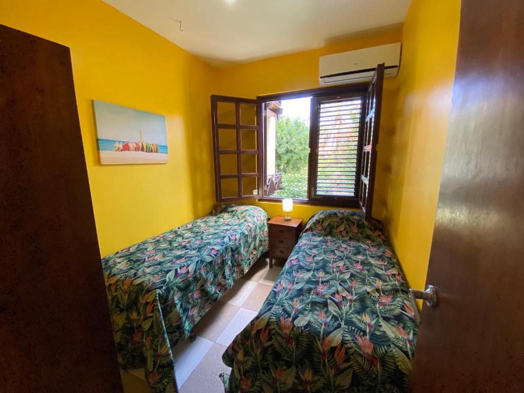 Postel nebo postele na pokoji v ubytování Blue Bay BEACH Villa 25 3-min beach-pool-golf