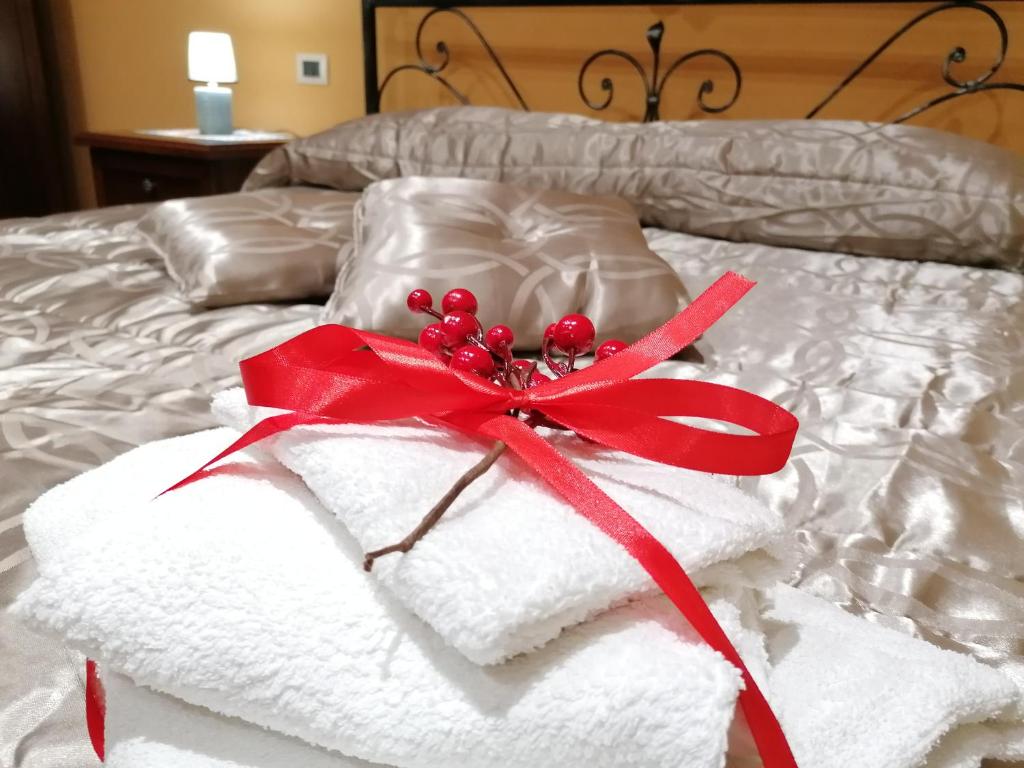 Łóżko lub łóżka w pokoju w obiekcie Casa delle Cicale