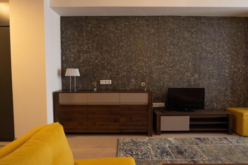TV a/nebo společenská místnost v ubytování New Gudauri Atrium Apartment 202