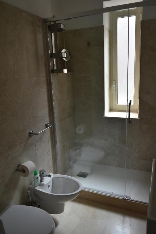 A bathroom at Zio Romano Apartment Rome - Vatican area
