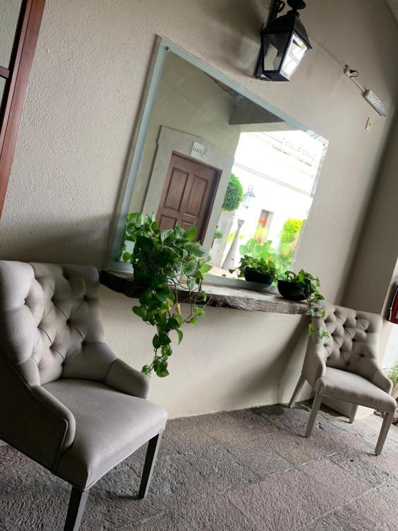 Posezení v ubytování Dos Patios Querétaro Curamoria Collection