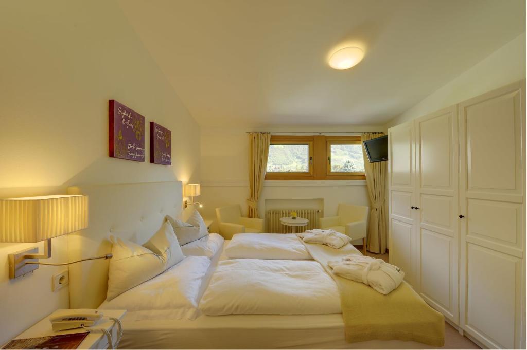 Postel nebo postele na pokoji v ubytování Hotel Dorner B&B