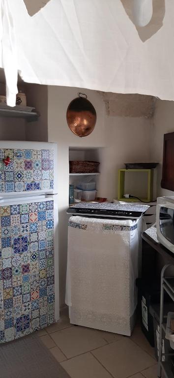 A kitchen or kitchenette at Che Vista!! Ostuni ,sulle bianche mura con vista mozzafiato