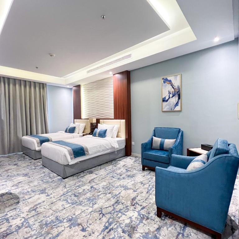 Postel nebo postele na pokoji v ubytování فندق ليفيل ناين Level Nine Hotel