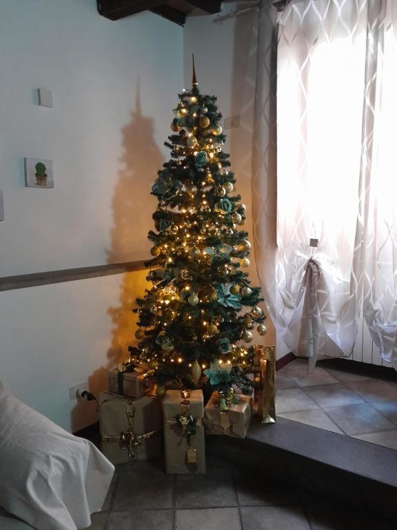 Łóżko lub łóżka w pokoju w obiekcie A casa di Grazia